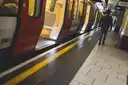 London Underground train with open doors at a Baker Street platform