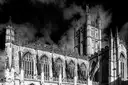 Bath Abbey's Gothic windows and tower in black and white
