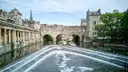 Pulteney Bridge and the curved weir on the River Avon in Bath