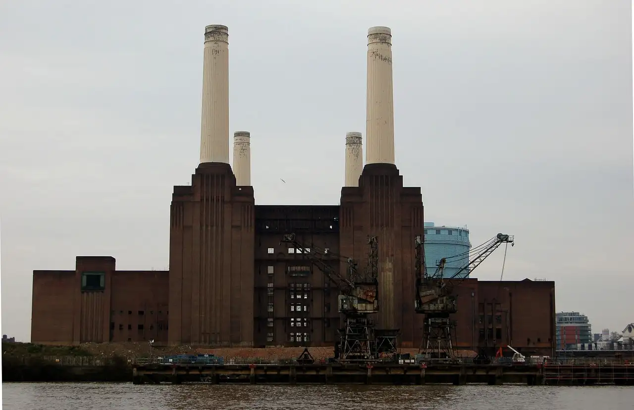 Battersea Power Station and its white chimneys, seen across the Thames