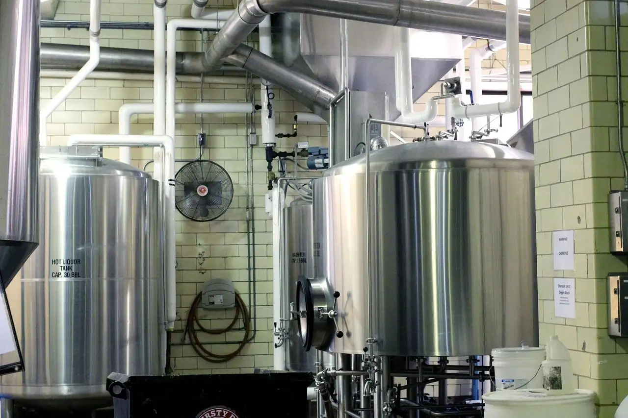 Stainless steel brewing tanks in a working brewery