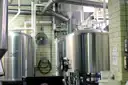 Stainless steel brewing tanks in a working brewery