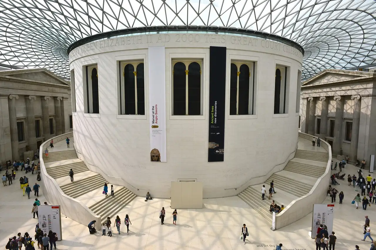 British Museum Great Court with its glass lattice roof around the round Reading Room