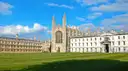 King's College Chapel across a wide green lawn in Cambridge