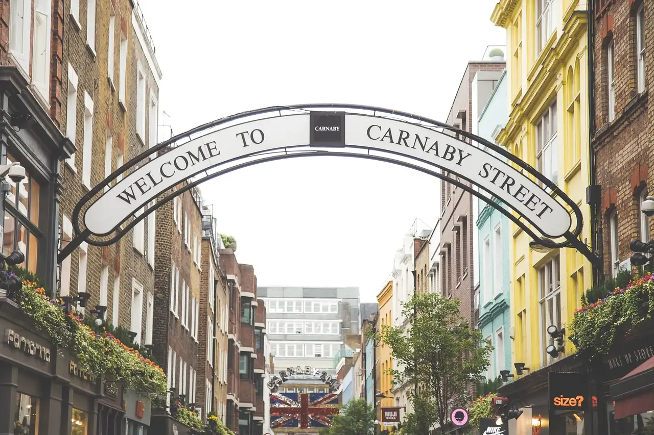 The Carnaby Street arch in Soho on a bright day