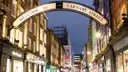 The Welcome to Carnaby Street arch in Soho at dusk