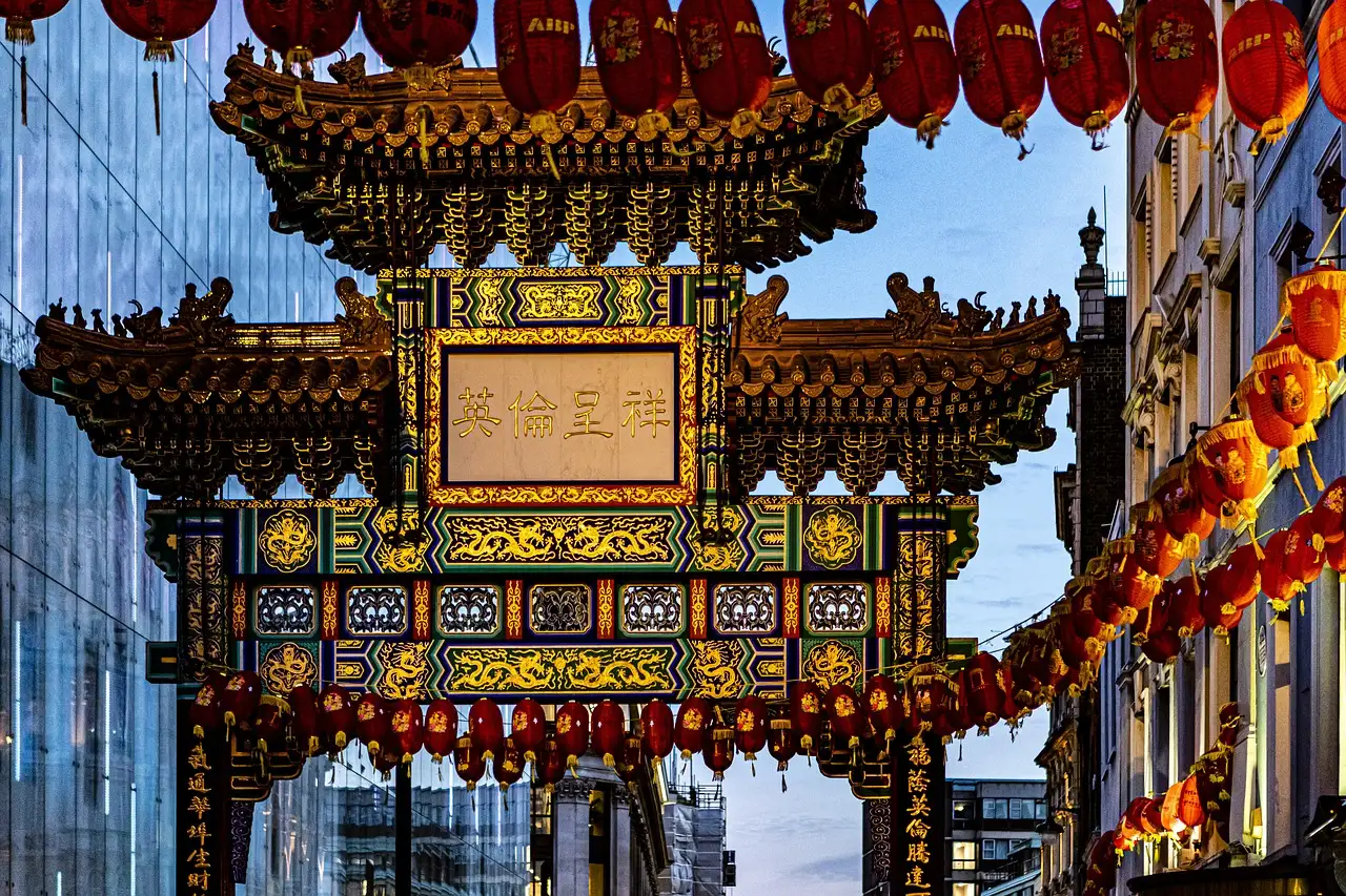 The ornate gate of London's Chinatown hung with red lanterns