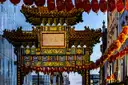 The ornate gate of London's Chinatown hung with red lanterns