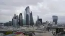 The City of London skyline under grey cloud, with the Walkie-Talkie tower on the right