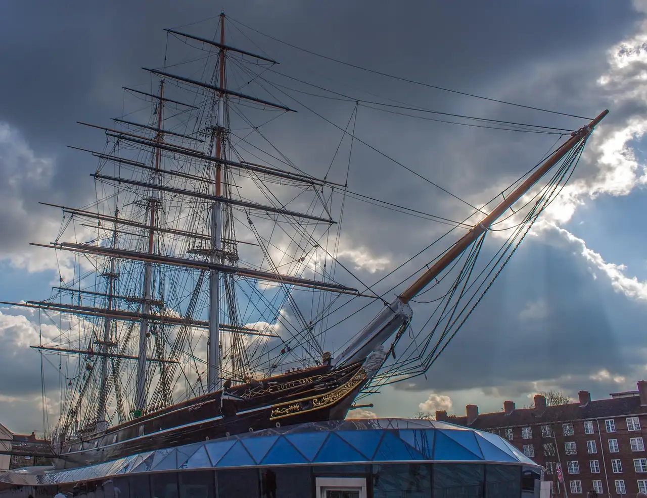 The Cutty Sark clipper ship at Greenwich under a dramatic sky