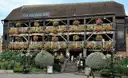 The timber-framed Dickens Inn pub at St Katharine Docks with flower-filled balconies