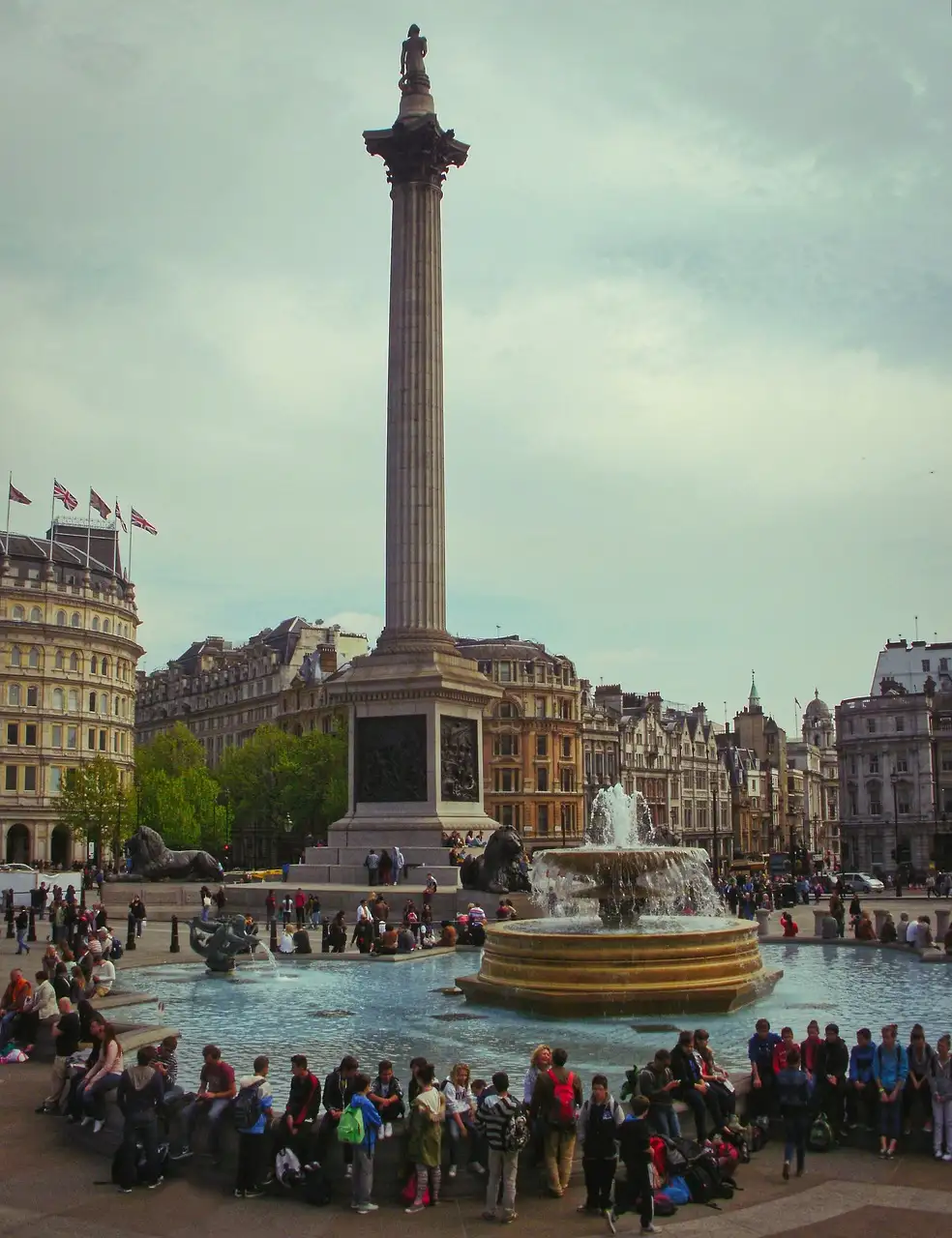 Nelson's Column rising above the fountains and crowds of Trafalgar Square