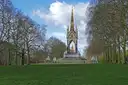 Albert Memorial at the end of a tree-lined lawn in Kensington Gardens