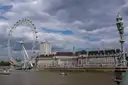 The London Eye and County Hall seen across the Thames from Westminster Bridge