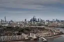 Wide daytime view over London, with the City towers and the Shard on the skyline