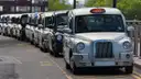 Line of London taxis waiting at a rank