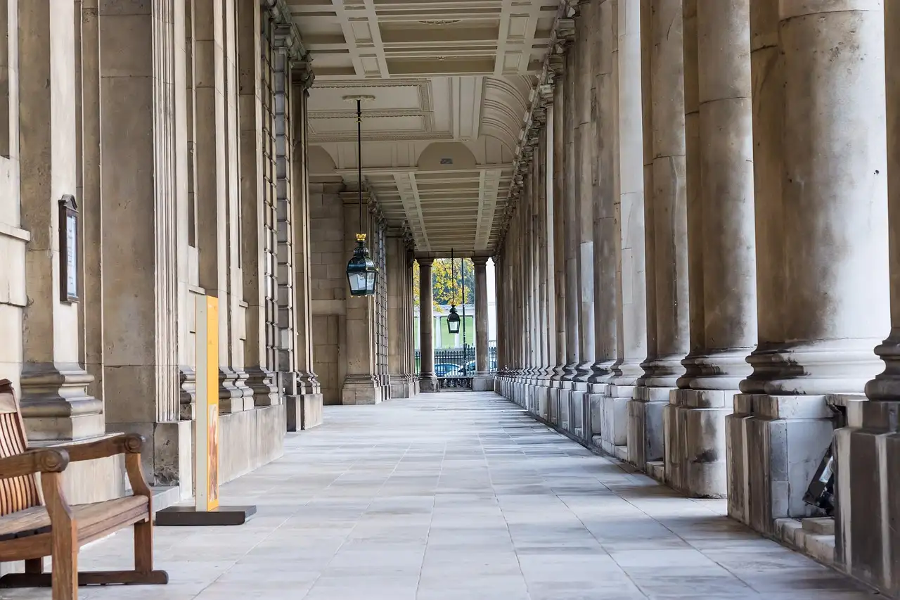 A long stone colonnade at the Old Royal Naval College in Greenwich