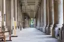 A long stone colonnade at the Old Royal Naval College in Greenwich