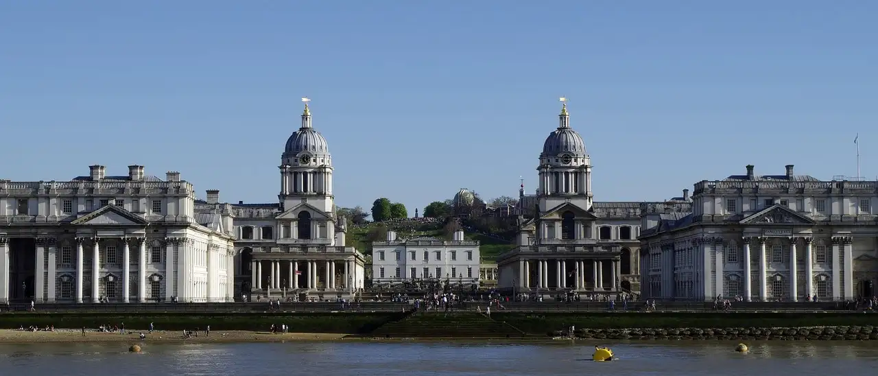 The twin domes of the Old Royal Naval College in Greenwich seen across the Thames