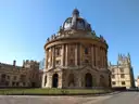 The domed Radcliffe Camera in Oxford under a deep blue sky
