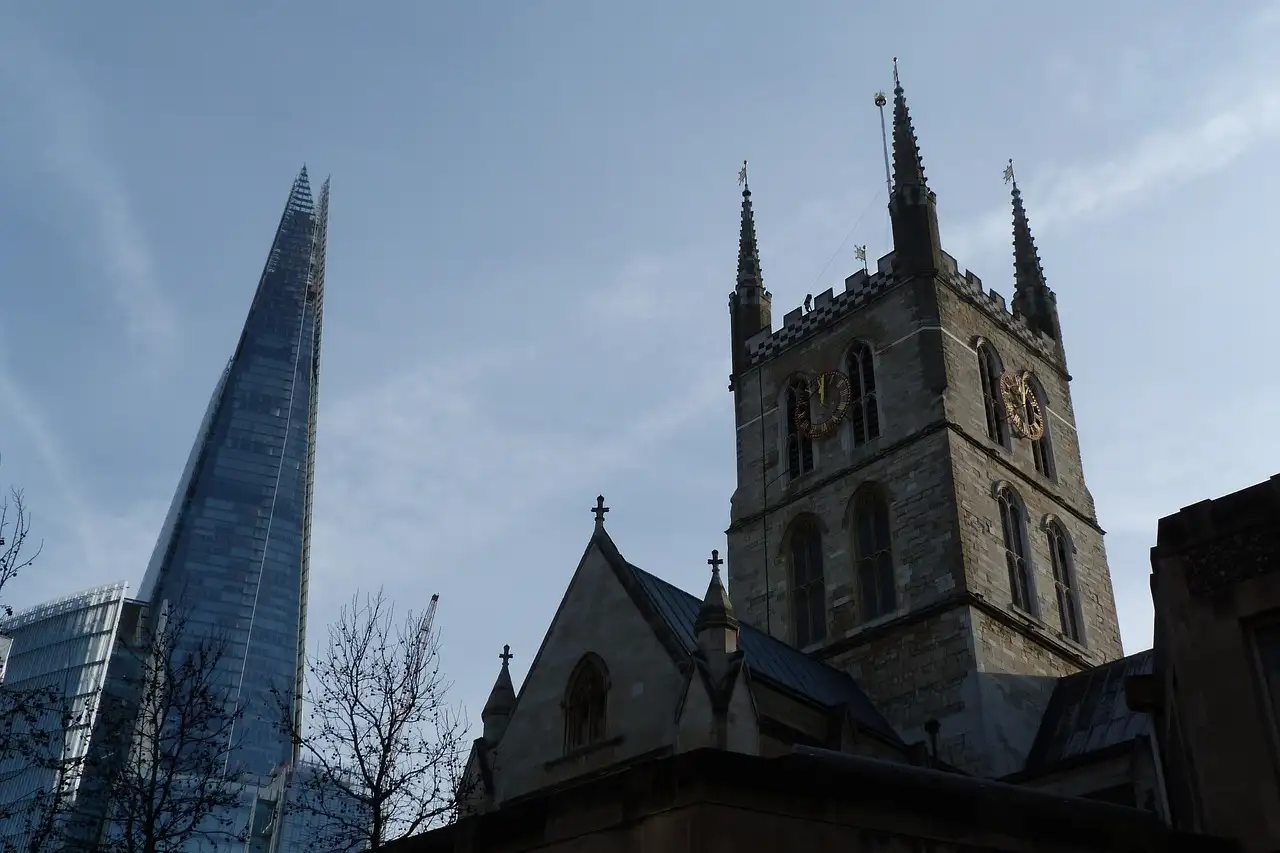 Southwark Cathedral's tower at dusk, with the Shard beside it