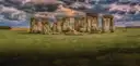 Stonehenge stone circle on Salisbury Plain under a dramatic cloudy sky