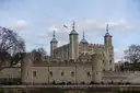 The Tower of London's White Tower rising behind the fortress walls