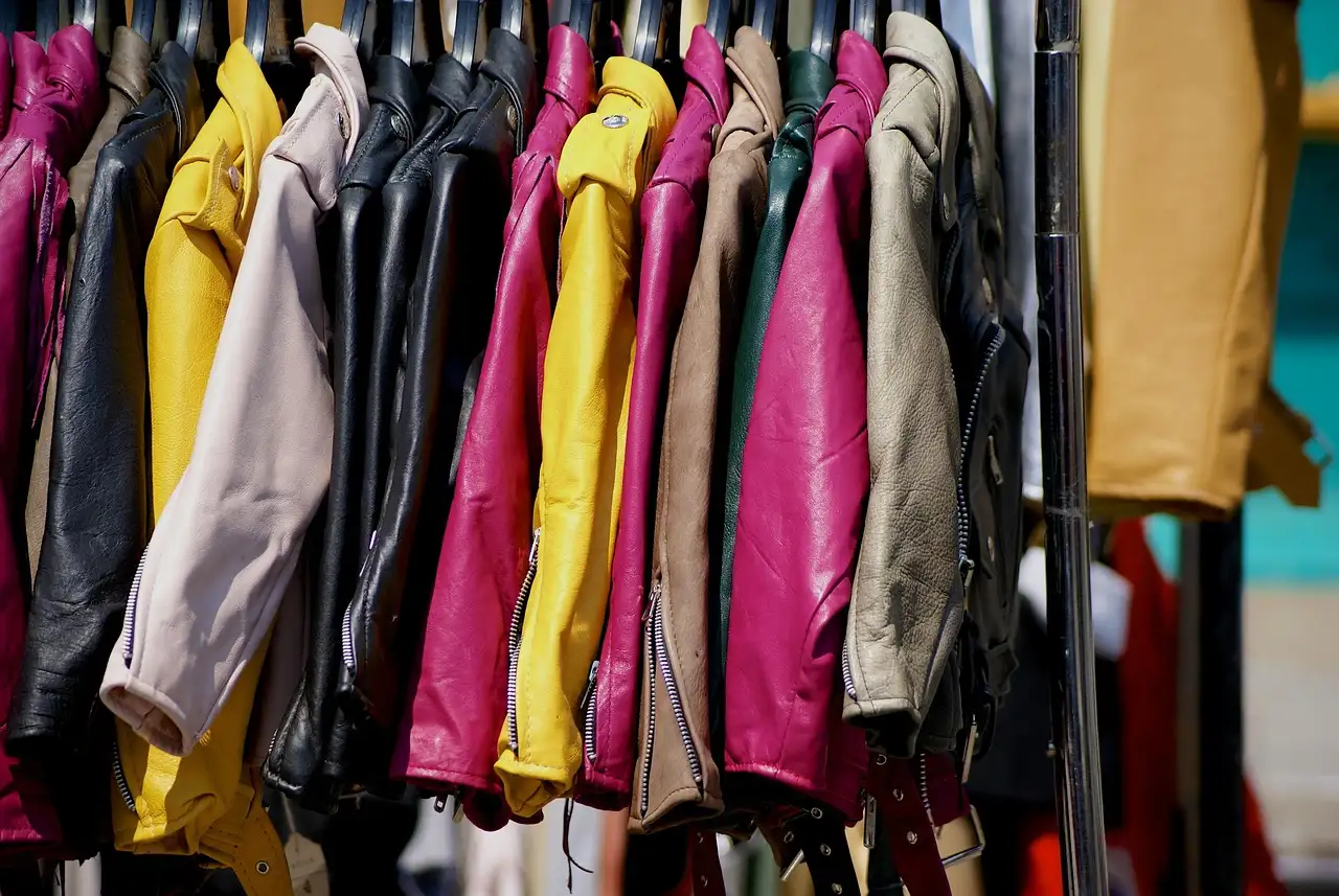 Colourful vintage jackets hanging on a clothes rail
