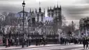 Westminster Abbey seen from across the road with street lamps in front