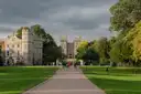 Visitors on the Long Walk heading up to the twin towers of Windsor Castle's George IV Gateway